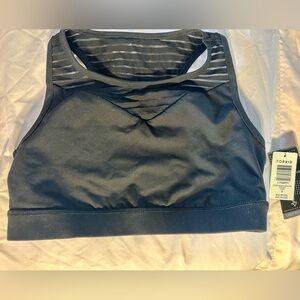 Torrid Sports Bra.  Mesh detail, racer back.  Light/Medium support.  Sz 12. New